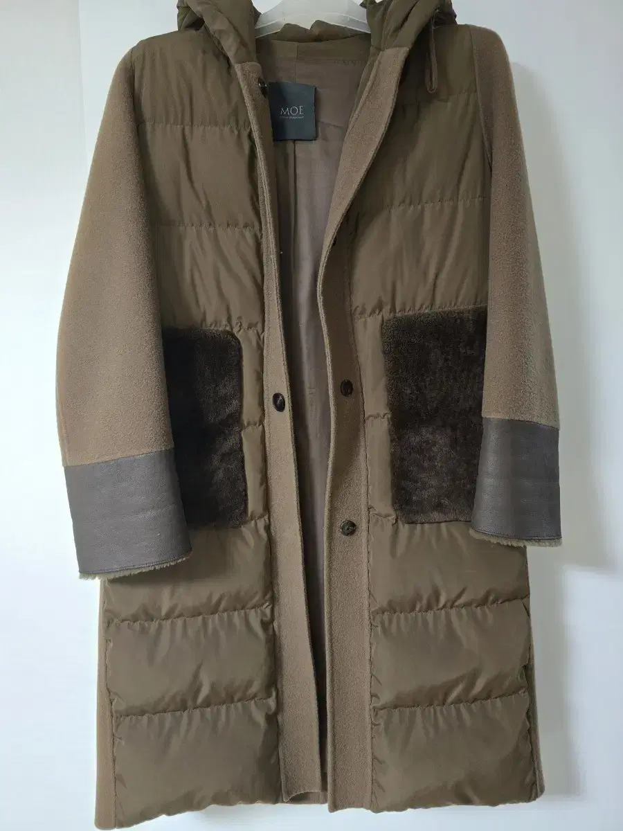 Moegus down hooded puffer coat.large Quick sale