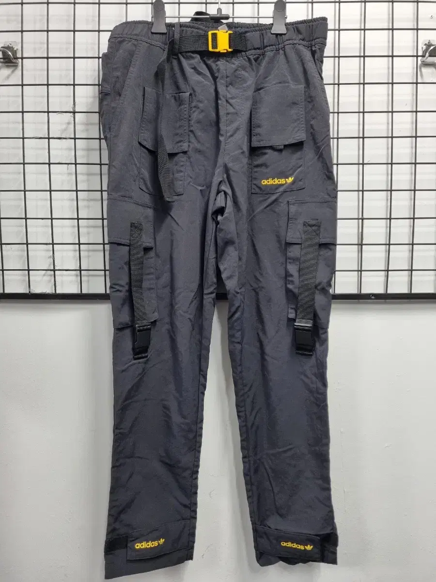 100L Adidas Tech Pants.