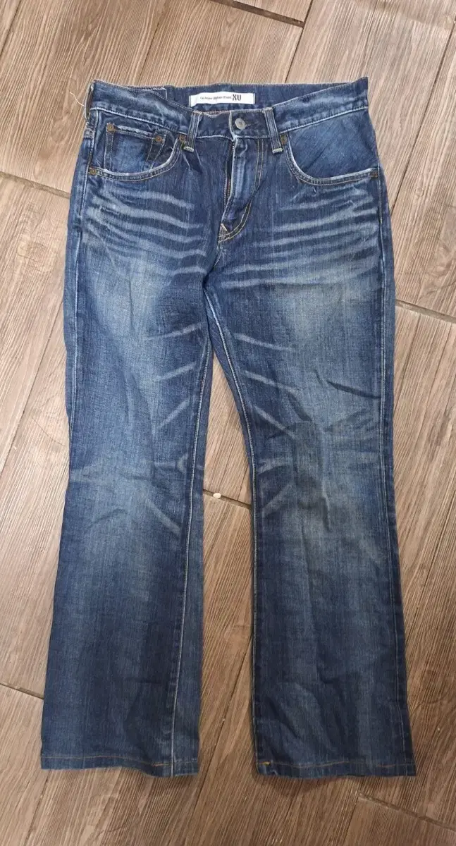 Unused Edwin jeans size 29 with pockets on both sides and back pockets.