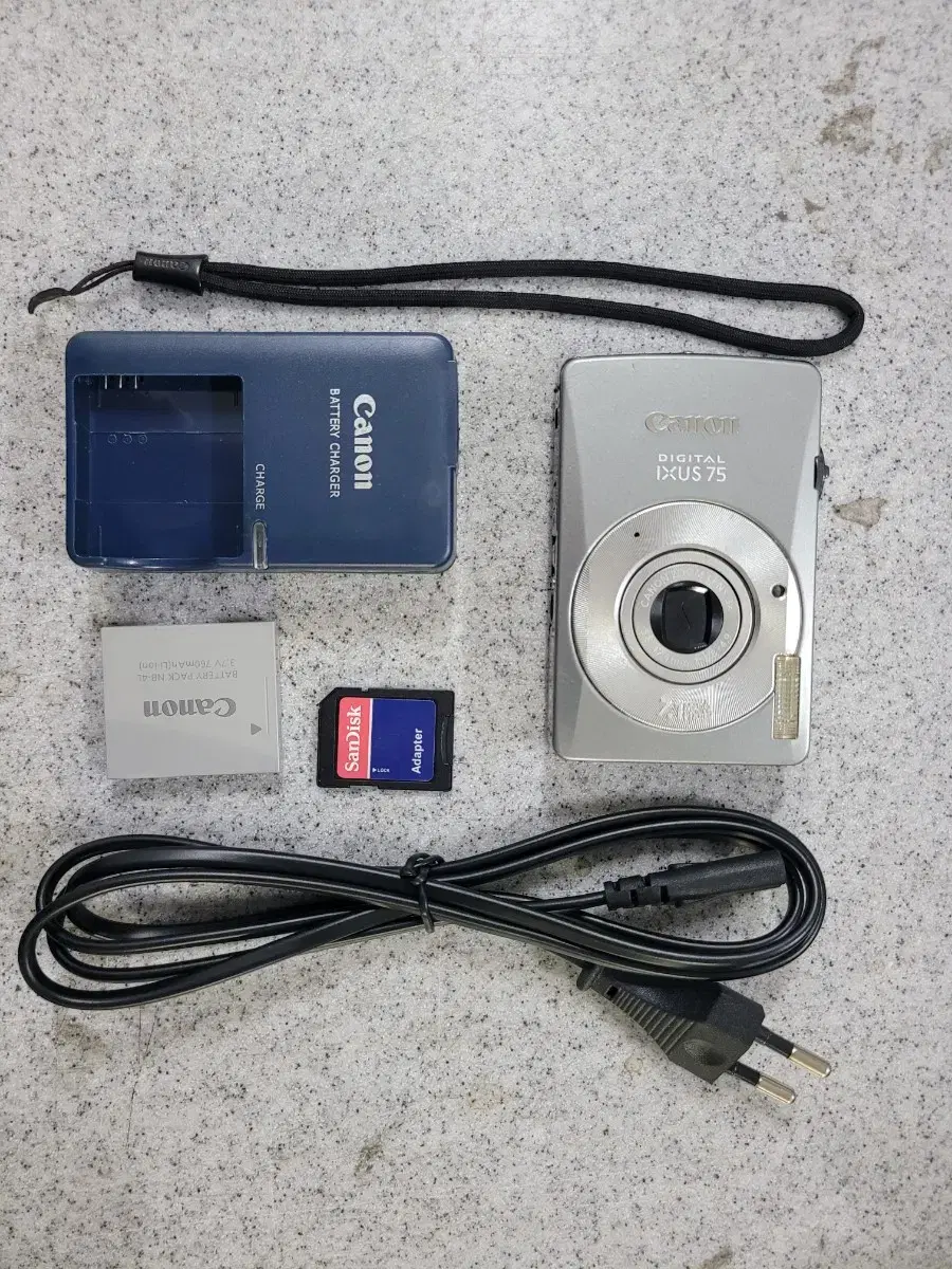 Ixus 75 (Canonica, Dica)