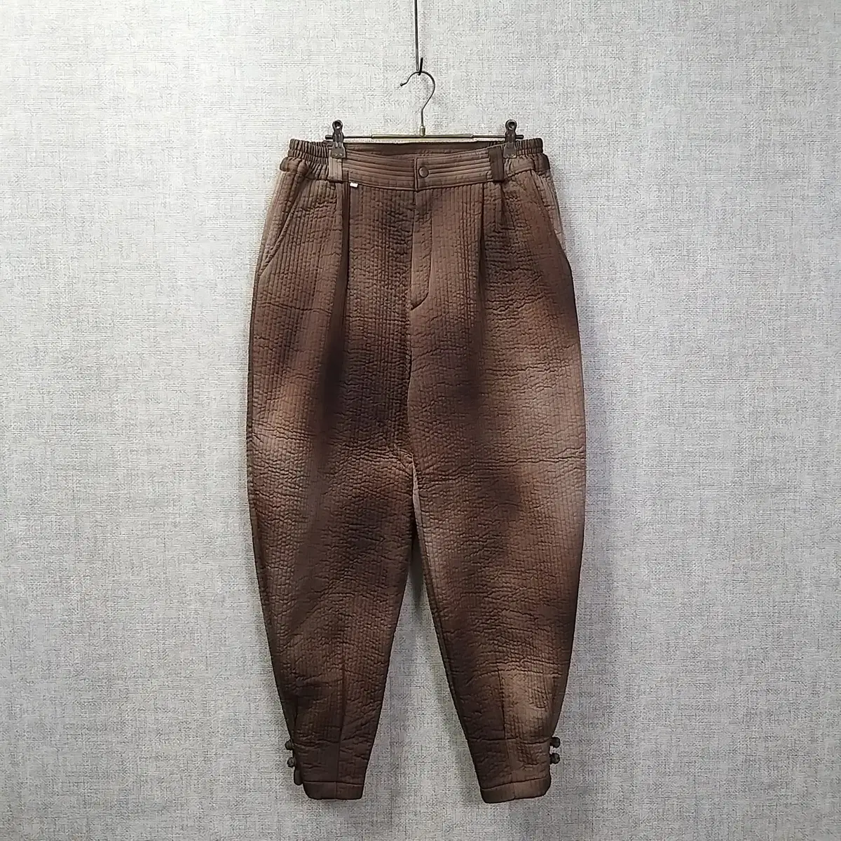 9. dark brown nylon quilted everyday pants men30