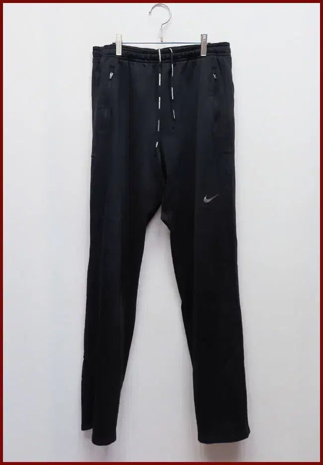 Nike/black track pants/33 inches/babongoo