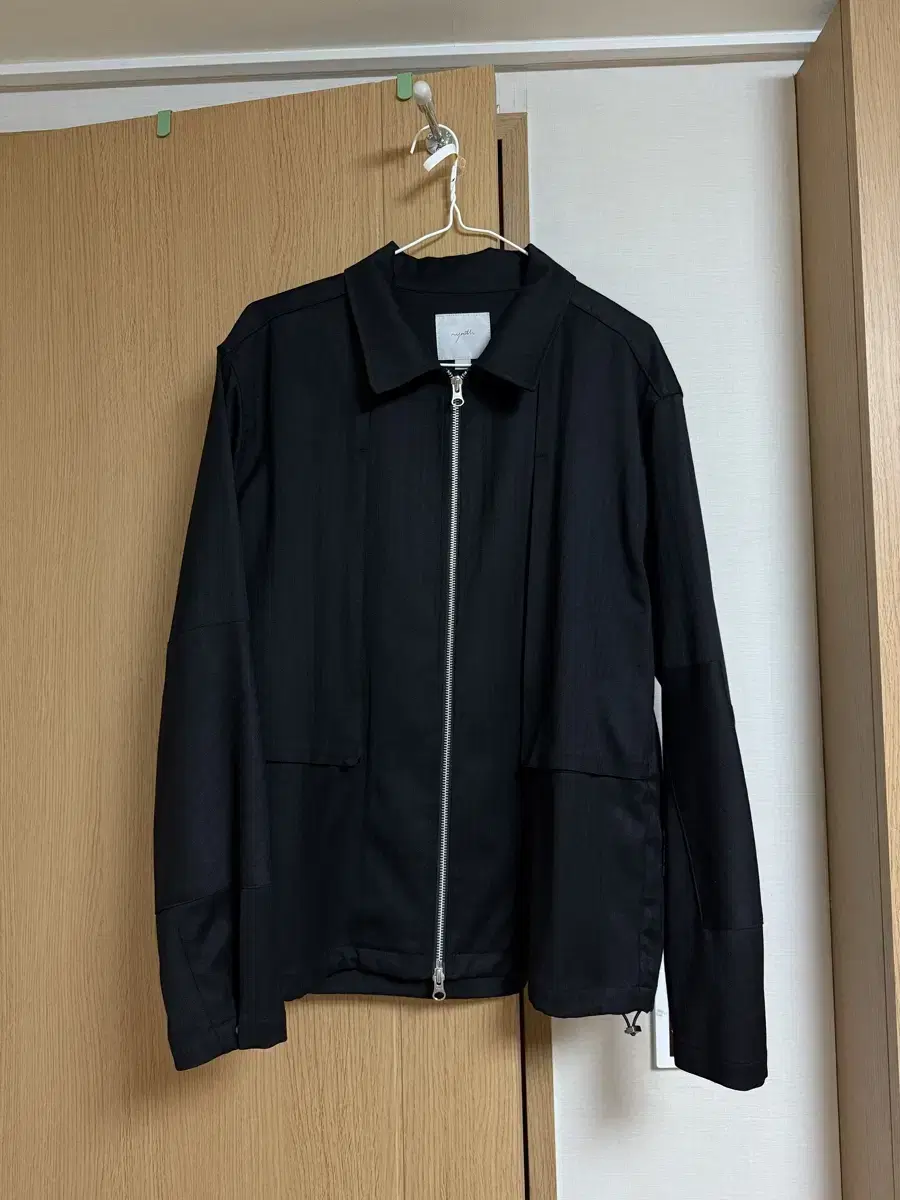 U's Drizzler Jacket in black, size medium, for sale.