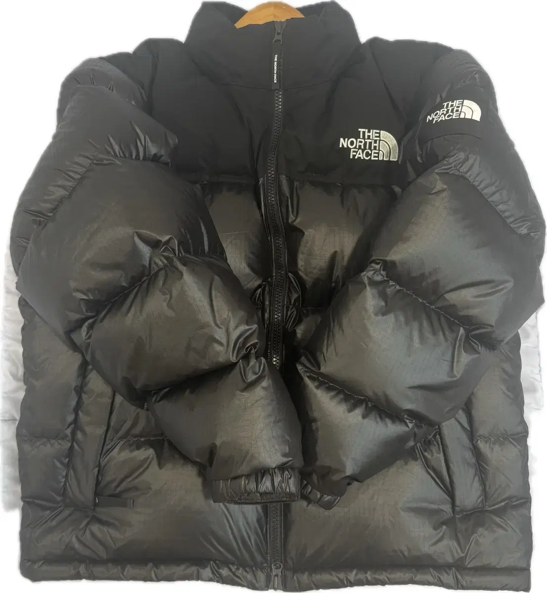 The North Face Knopsie Glossy