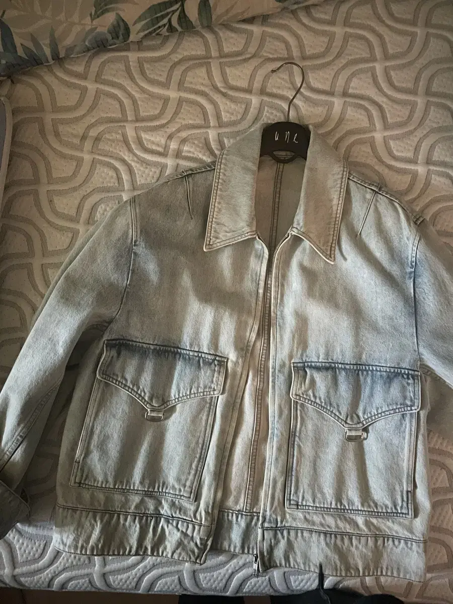 I have an oversized denim jacket with belly for sale in size Large.