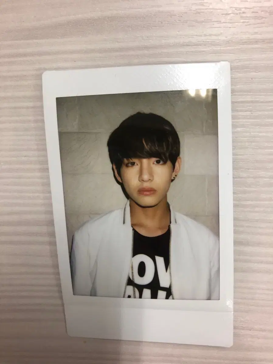 Steamed polaroid with only one BTS.