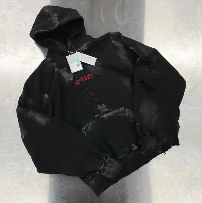 [1] Under Armour Sepultura Damage Washed Hooded Rubber Dirty Coat