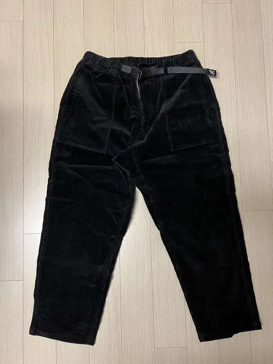 Grammich loose tapered corduroy in black sells for size M.