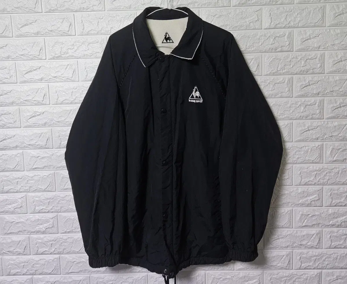 Le Coq Sportive Double-sided Hooded Windbreaker sells