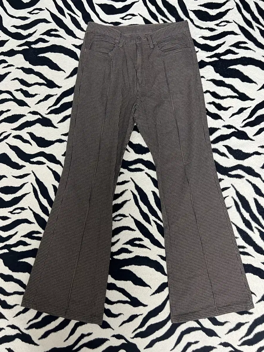 [32] Brown flared pants in capital check