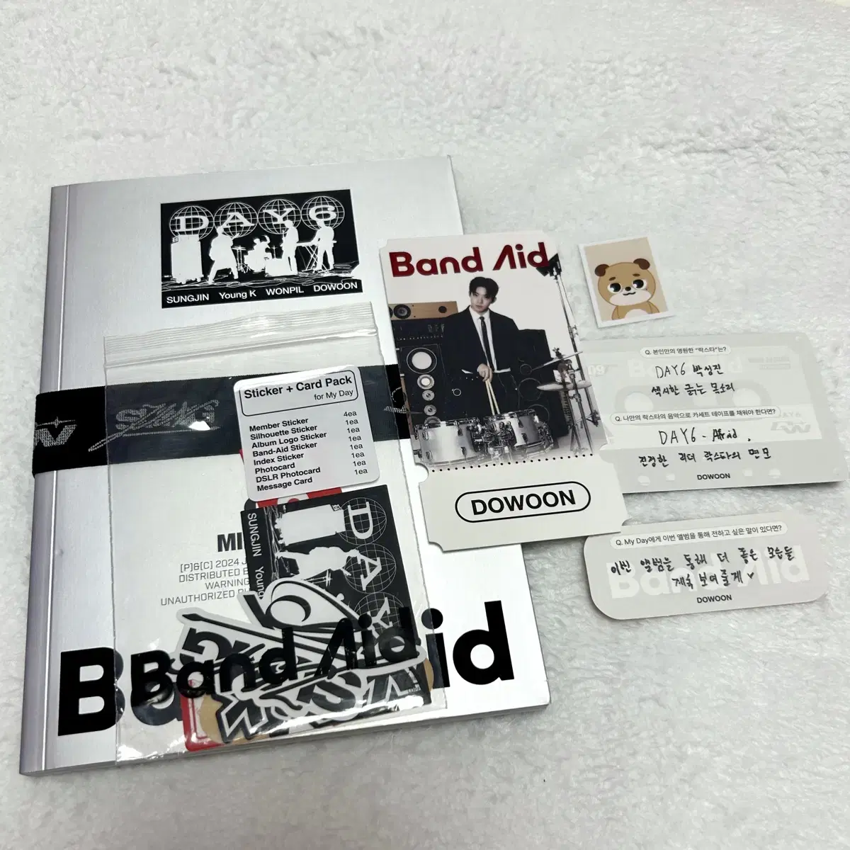 Day 6 Done Band-AidAlbum components, money increase