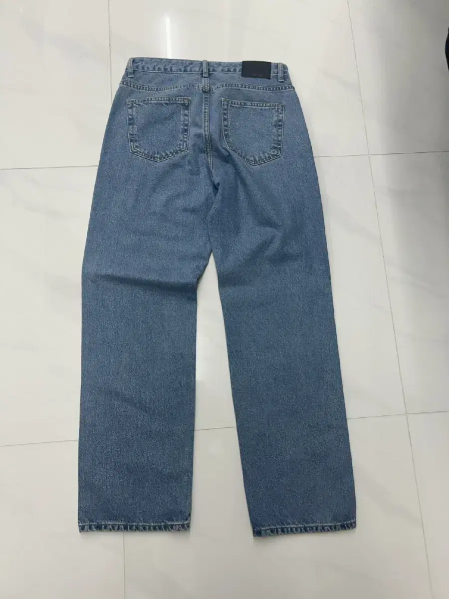 Branded wide straight denim pants light blue size 30 for sale.