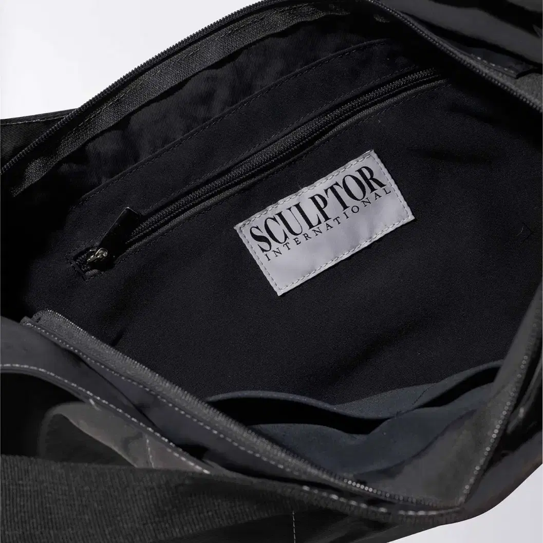 스컬프터 Nylon Moon Bag Charcoal 가방