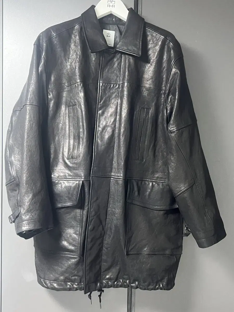 Polythene lambskin car coat black size 4