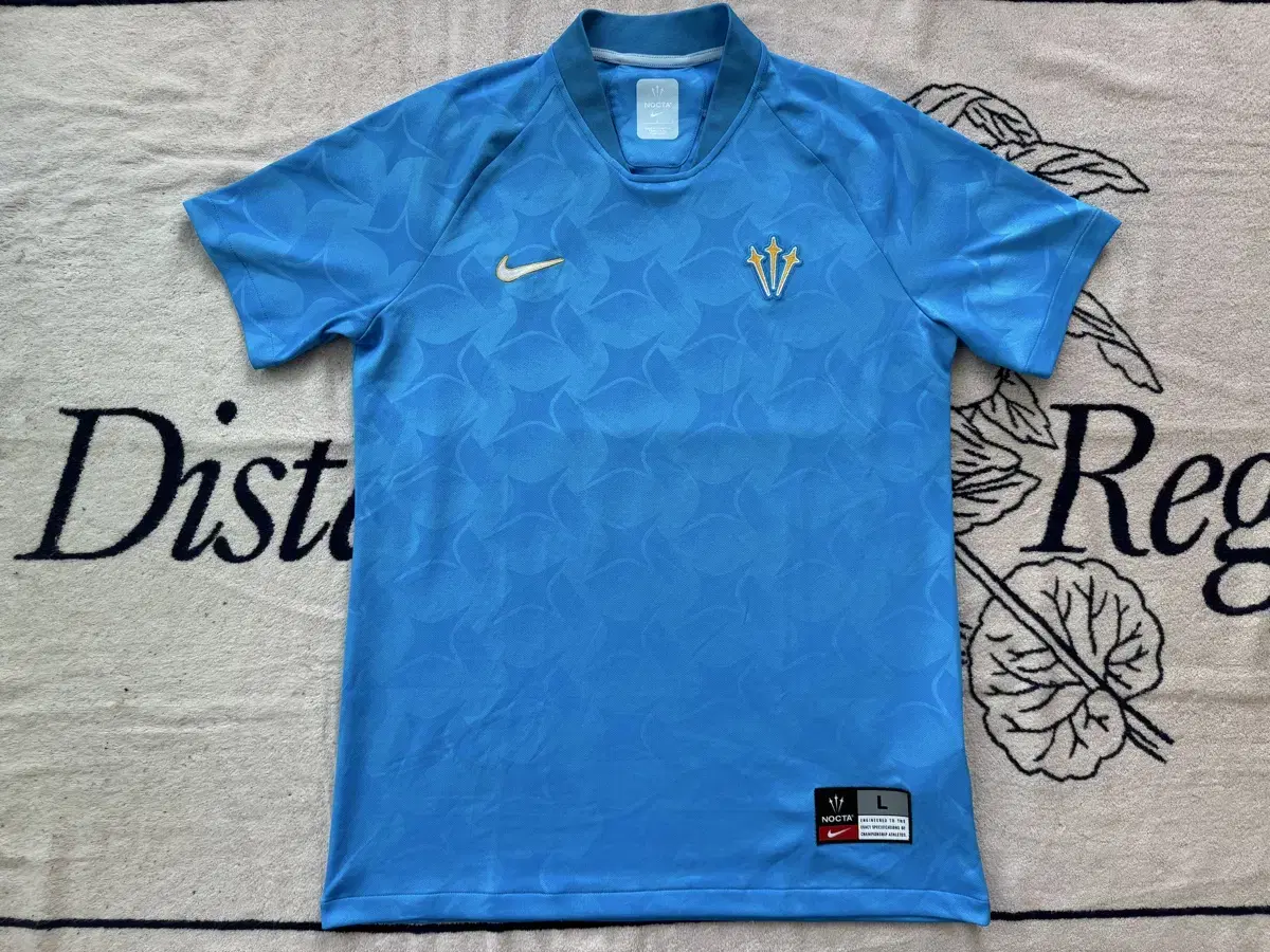 Nike x Drake Nocta Distant Regals Jersey bloo Glow T-Shirt NIK