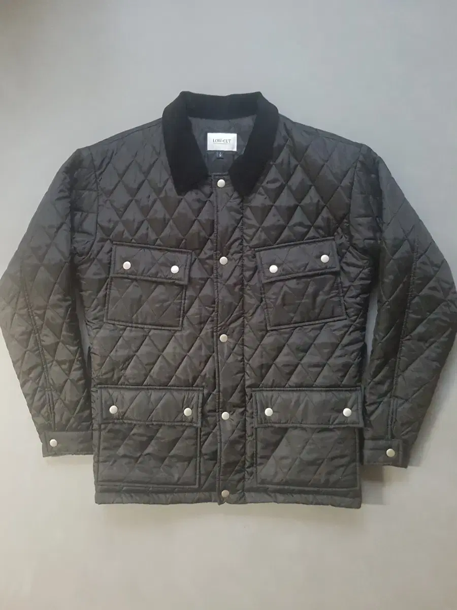 [M] Low-cut belted quilted jacket overfit barbour style