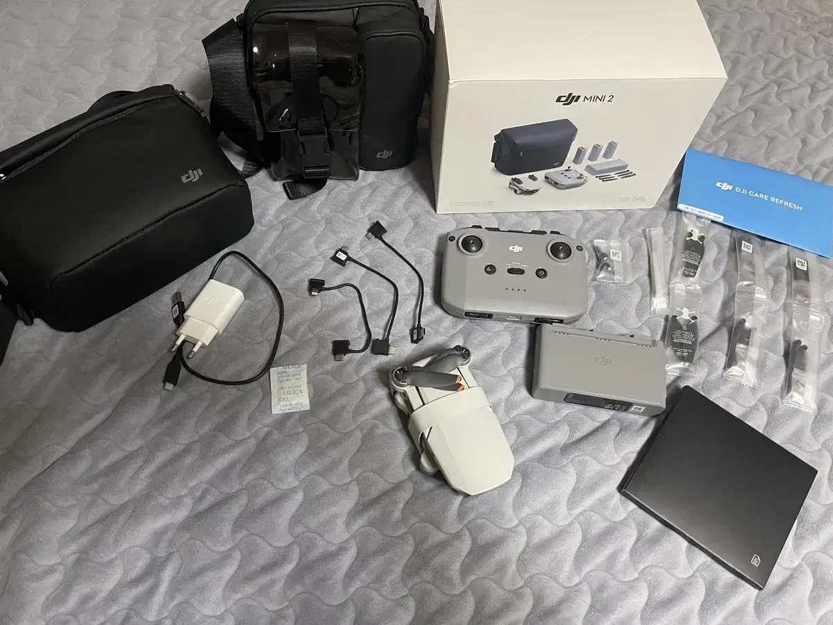 I am selling my DJI MINI 2 drone (all components + separately)