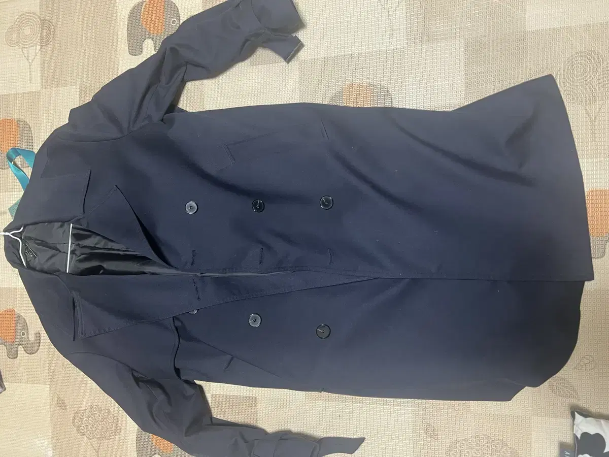 I'm selling a drawstring trench coat.