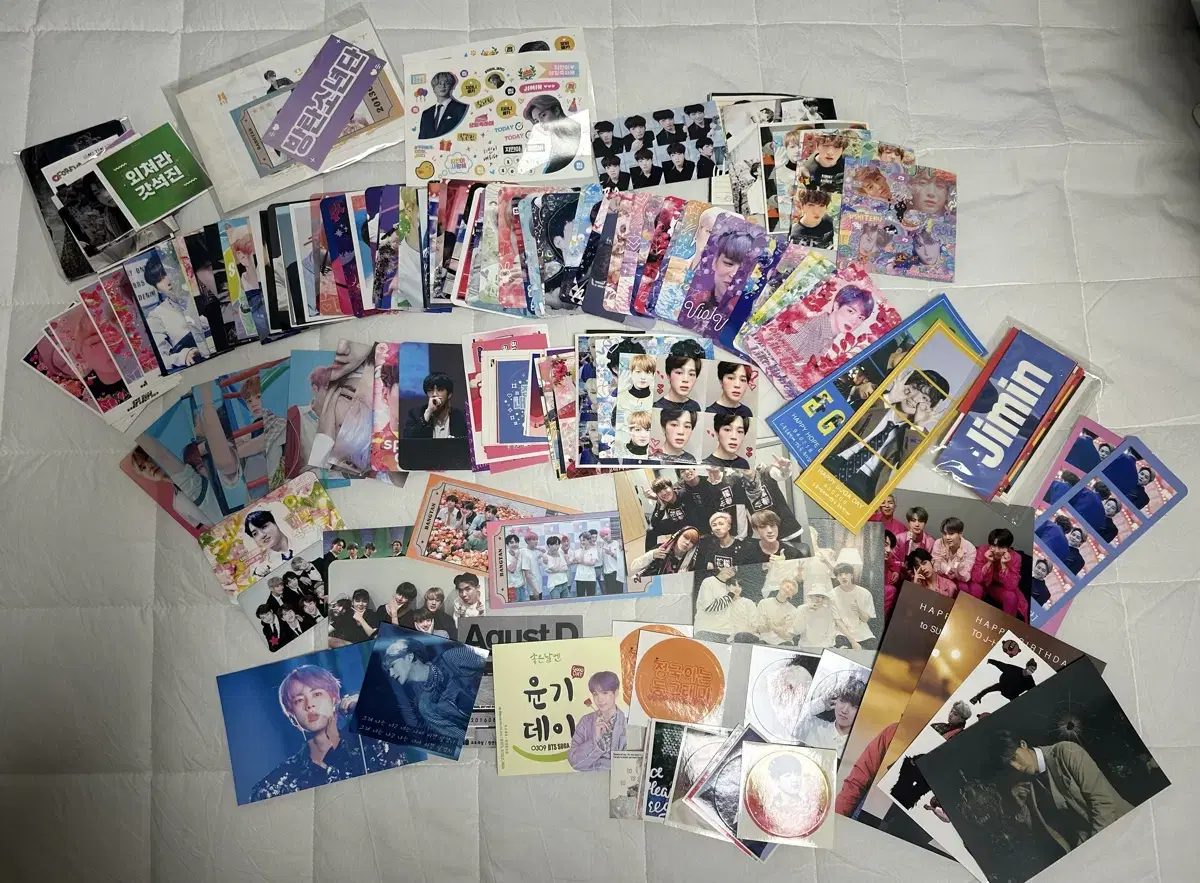 We sell 20 random photocards, stickers, and photos!