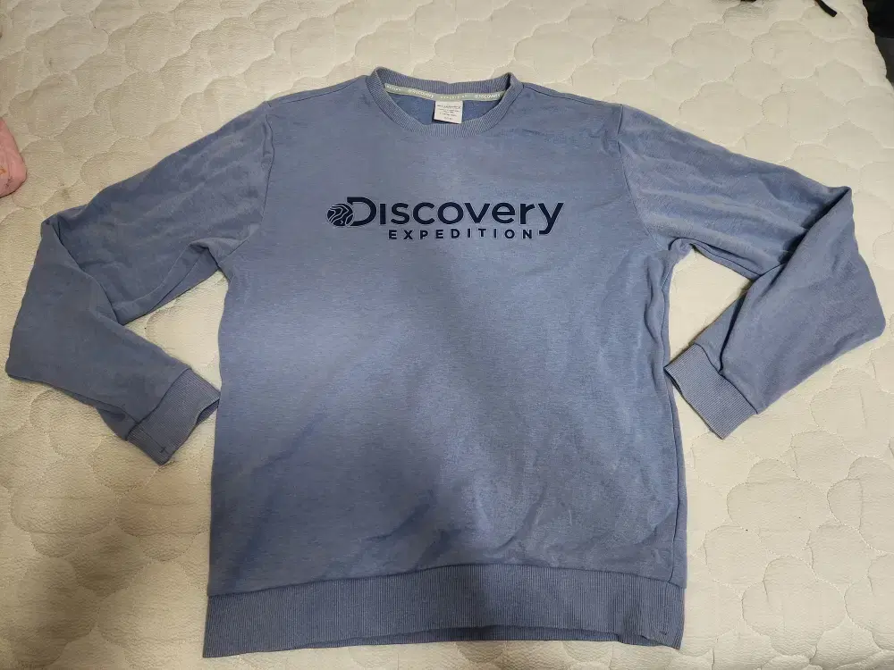 3. sell a size 95 Discovery t-shirt.