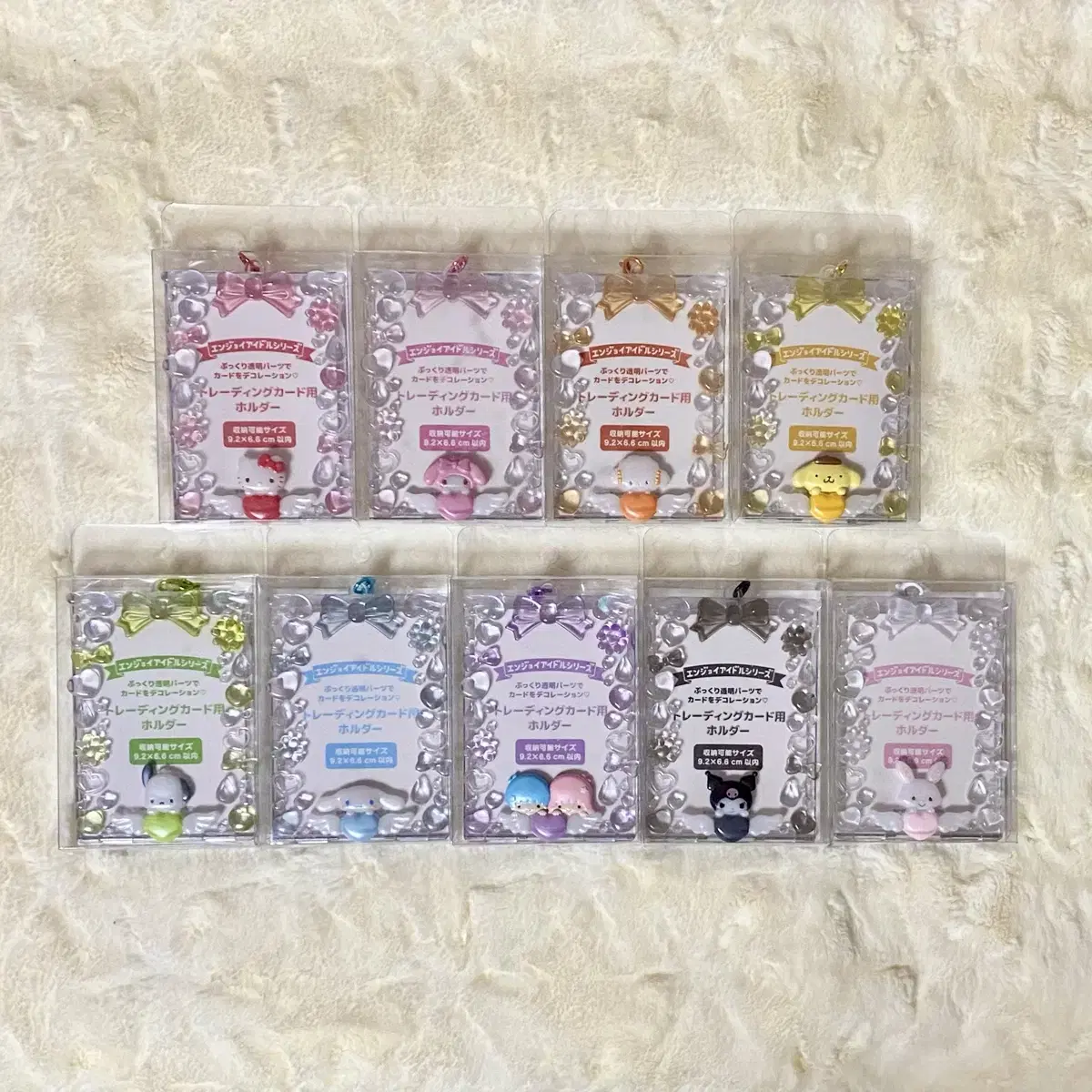 Unsealed Genuine) Sanrio Heart photocard holder toploader Hello KittyMarmelkogiMyungpompompompompurinkuromi