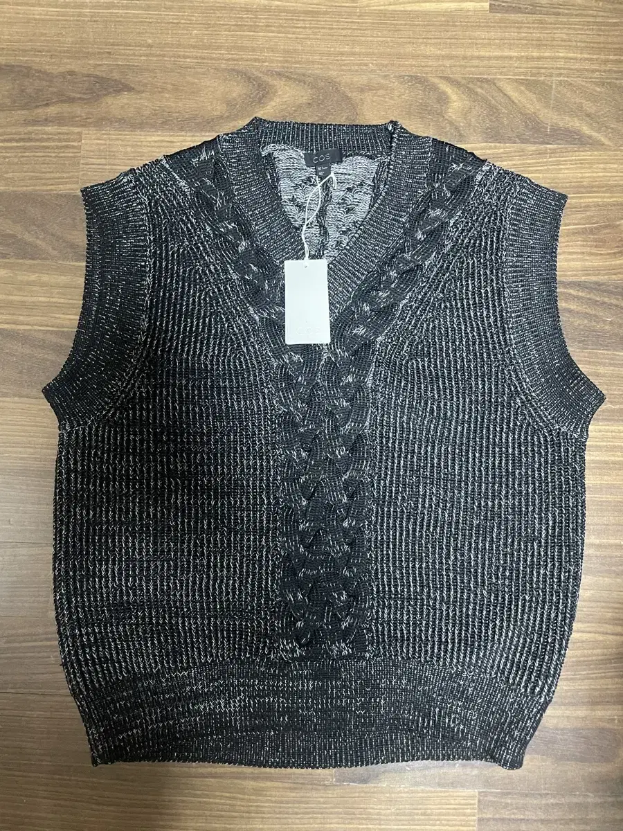 COS Knit Vest sells.