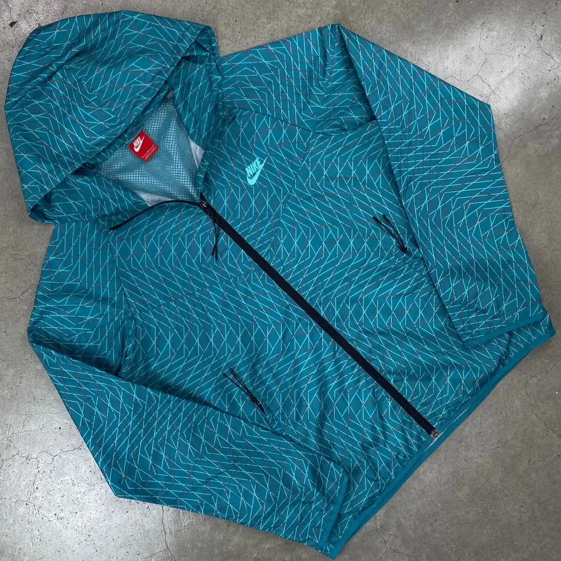 Nike Logo Patterned Windbreaker Windbreaker