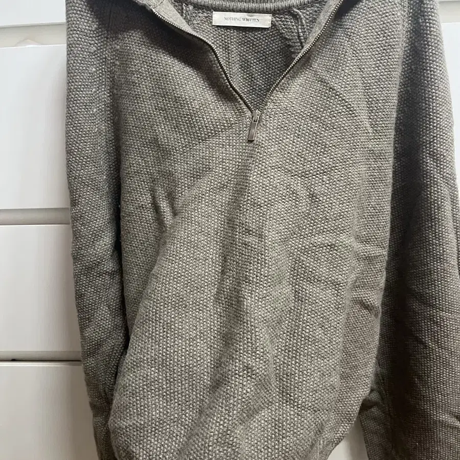 낫띵리튼 porter wool jumper 모카색상 팝니다