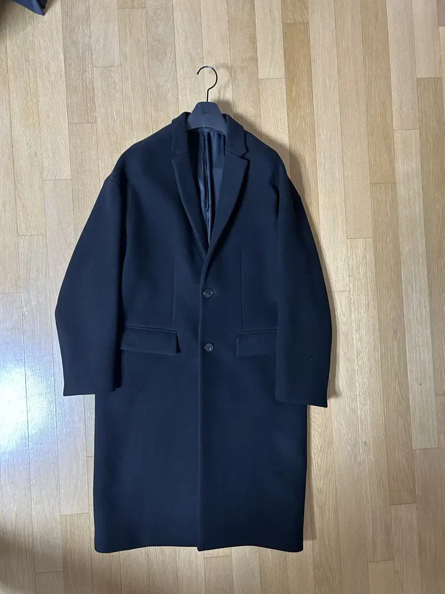 Junge black overcoat size 44