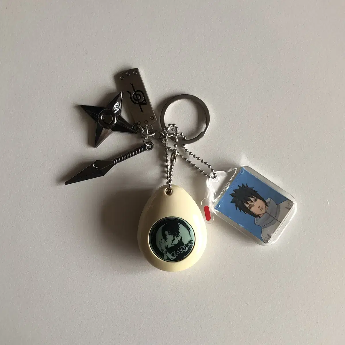 Naruto Sasuke Voice Keyring and Shuriken Proof Keyring