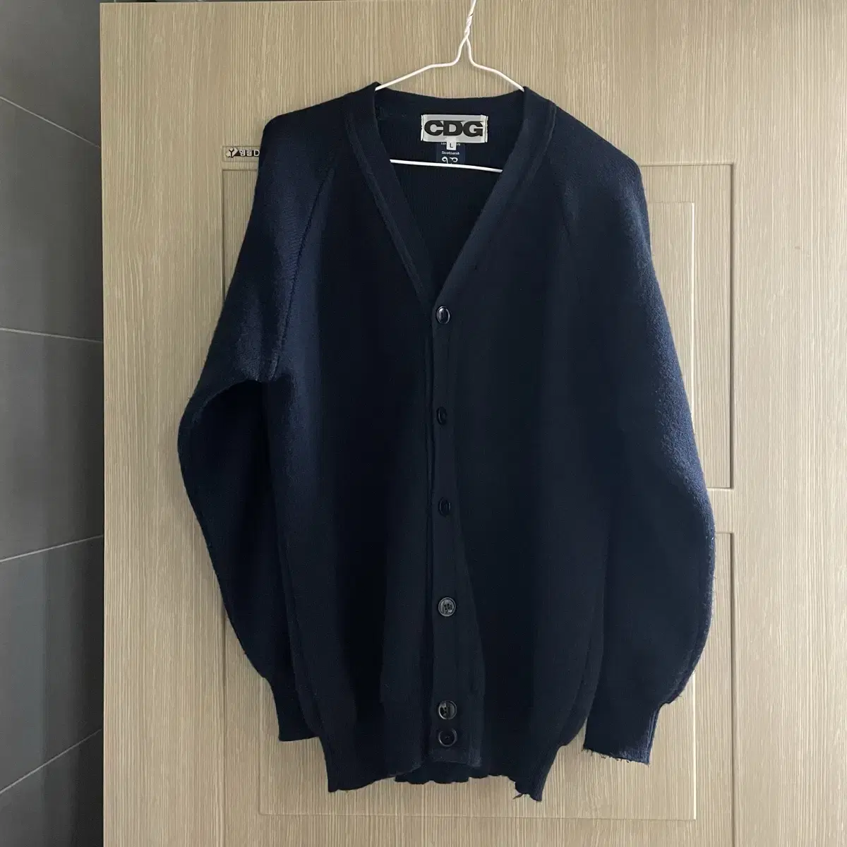 Comme des Garçons CDG Back Logo Cardigan in Navy/L