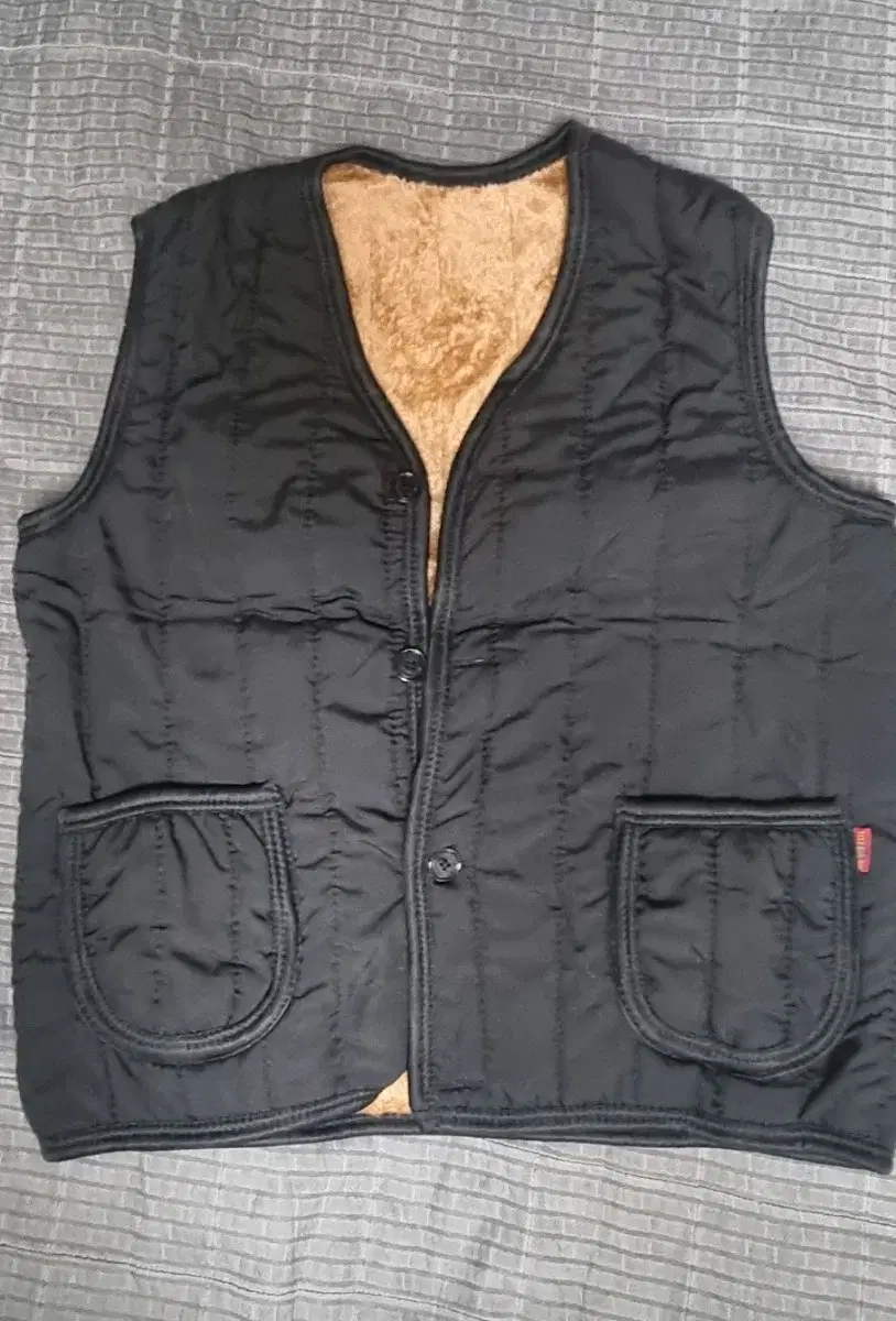 Selling a new cold weather fleece vest black 3XL.