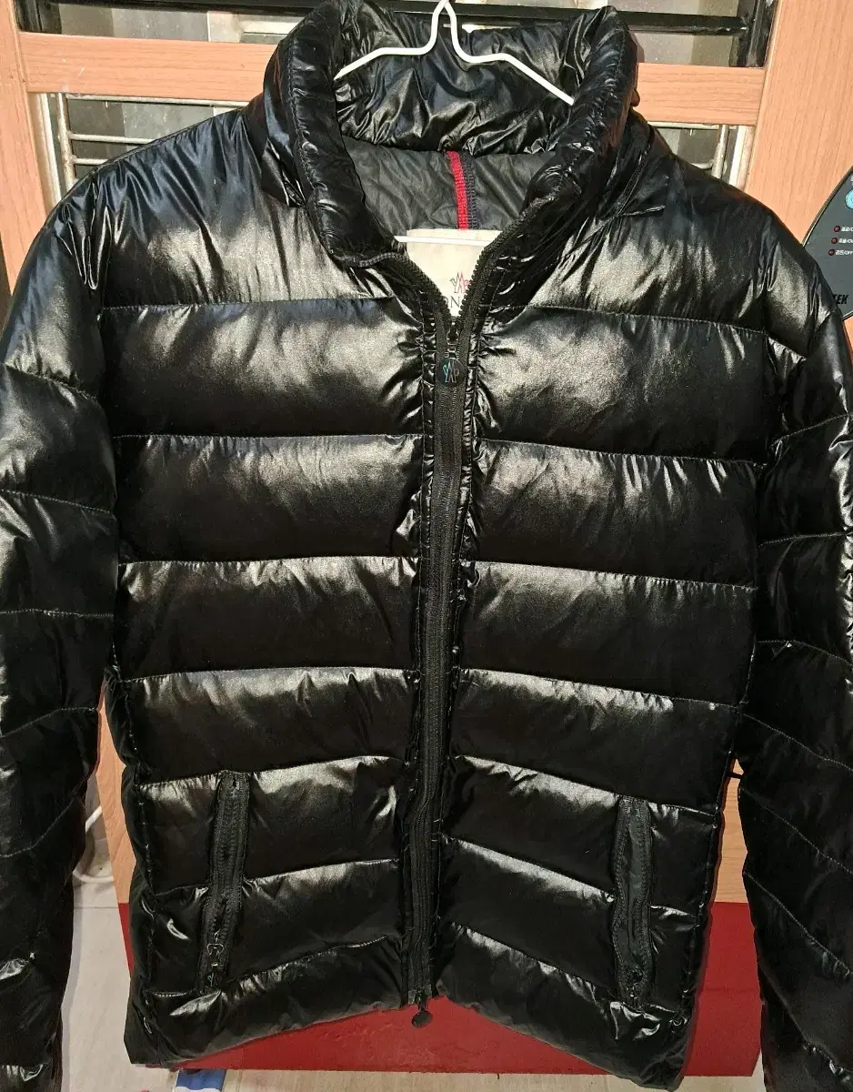 Anyone know the truth about moncler u glossy jump?