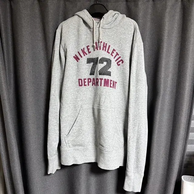 [L] Nike Sportswear hoodie in gray,