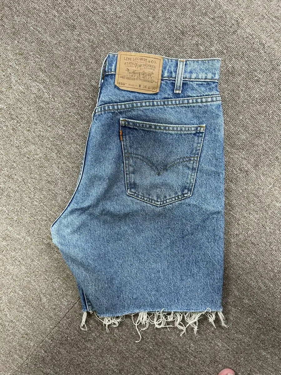 levi's 550 34/30 orange tap