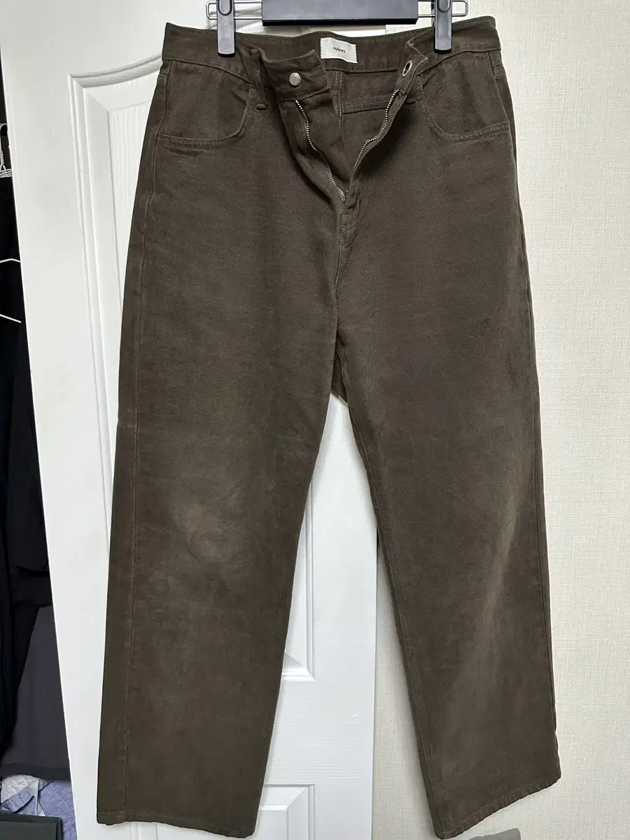 I'm selling the Myriad Brushed Pants in brown, size L.