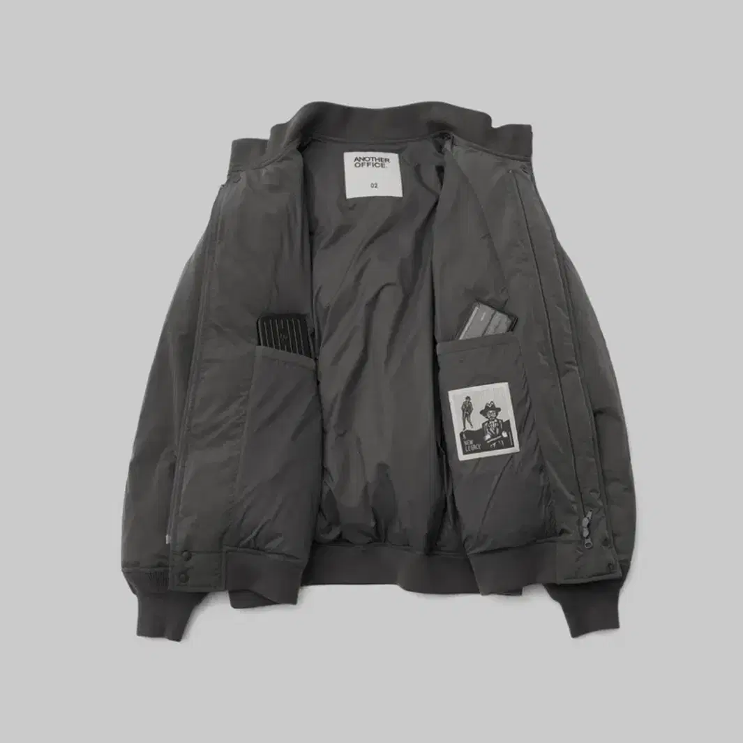 어나더오피스 layer down blouson graphite