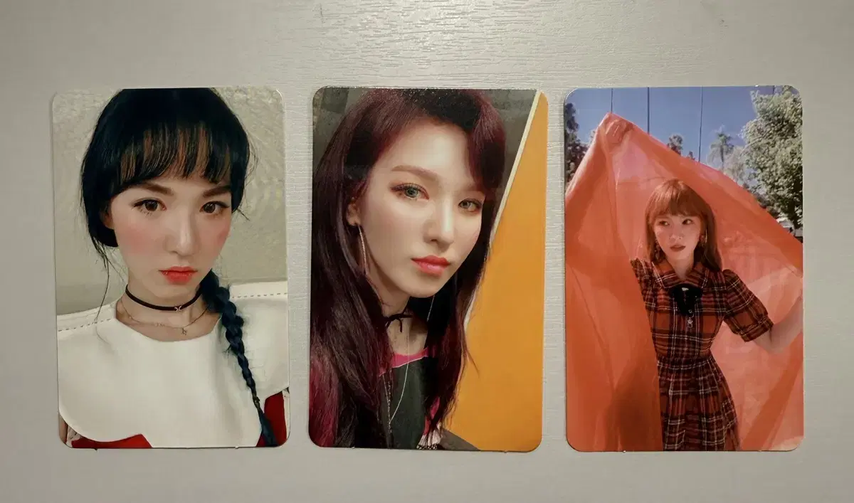 Red Velvet wendy Rookie, Bad Boy, and Peekaboo photocards.