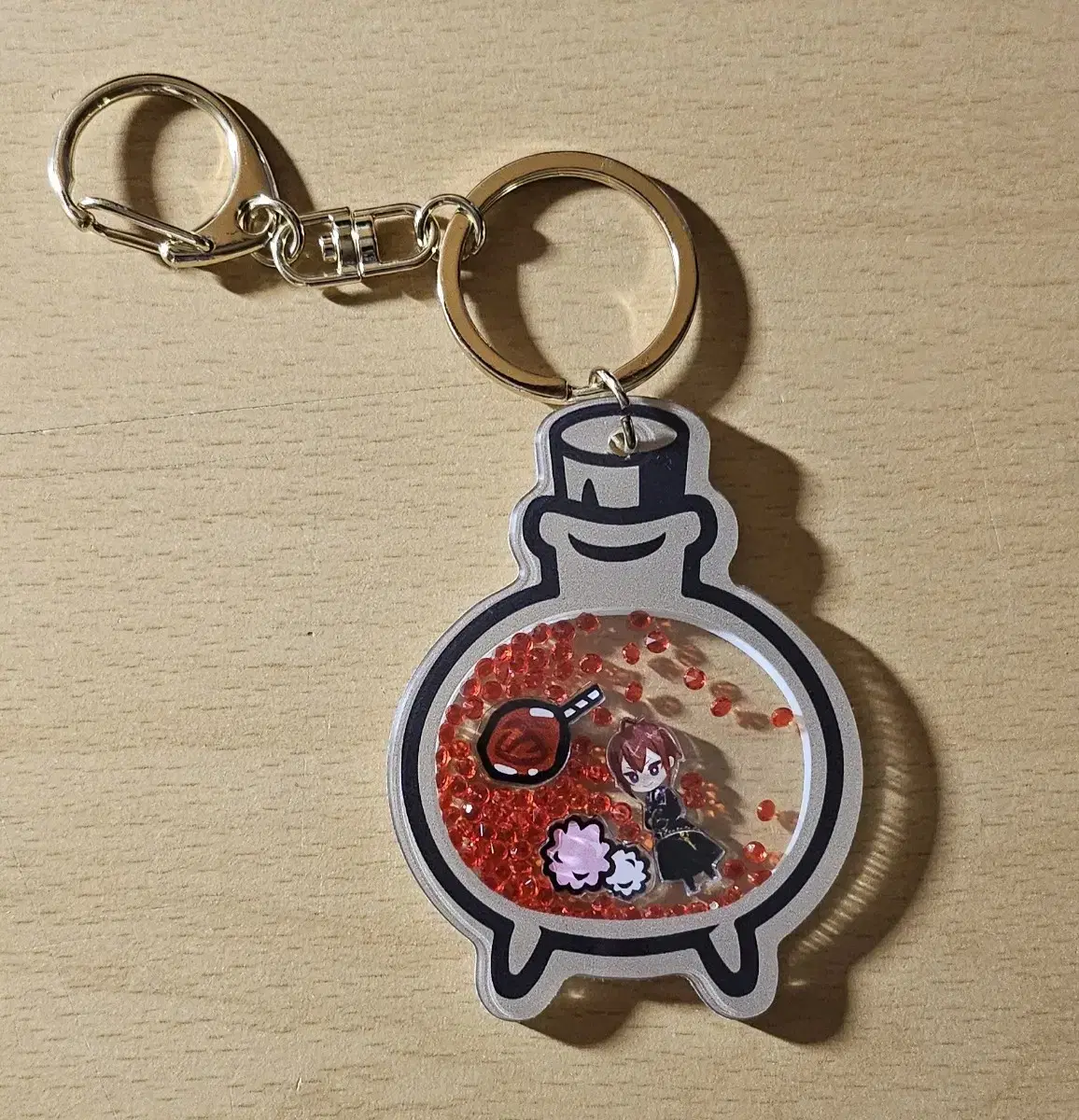 Twister Riddle acrylic keyring