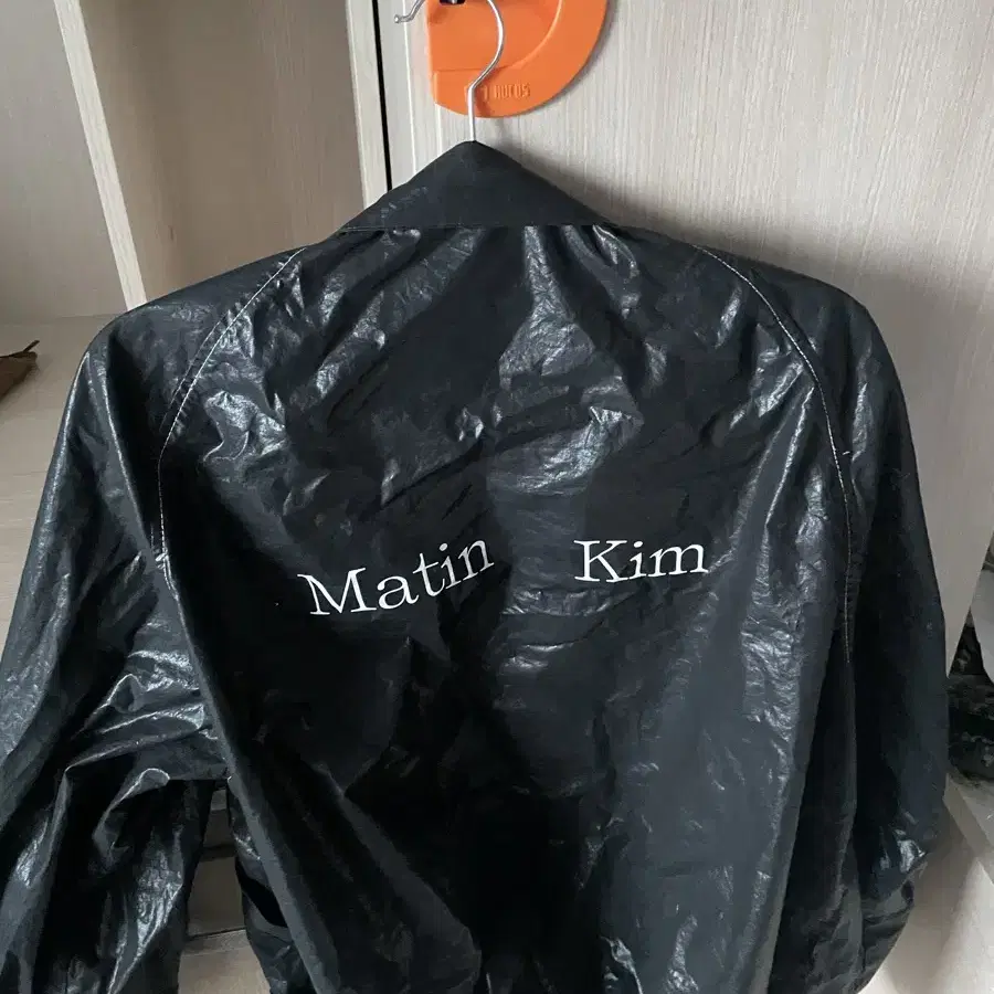 MATIN KIM LOGO COATING JUMPER