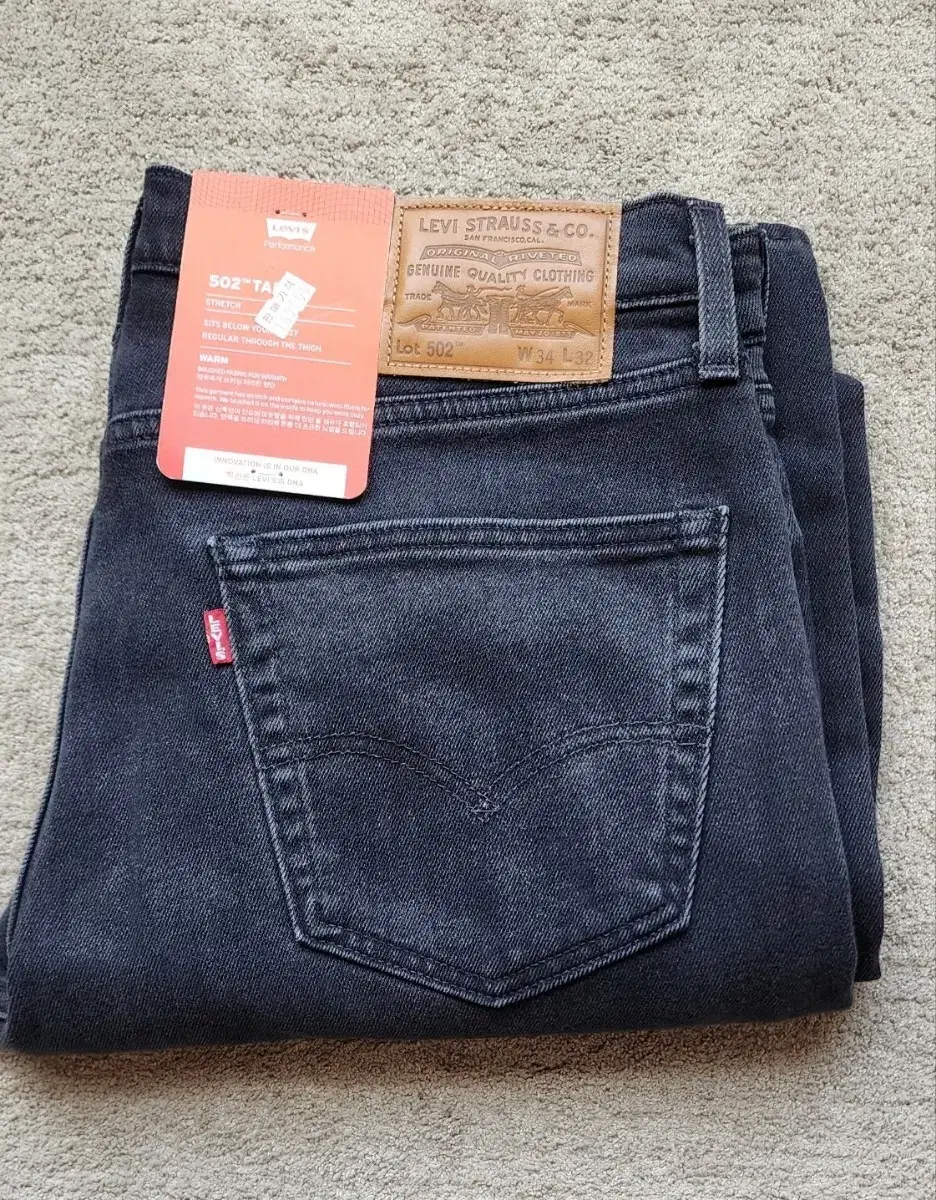 Levi's Jeans 502 W34 L32 sells