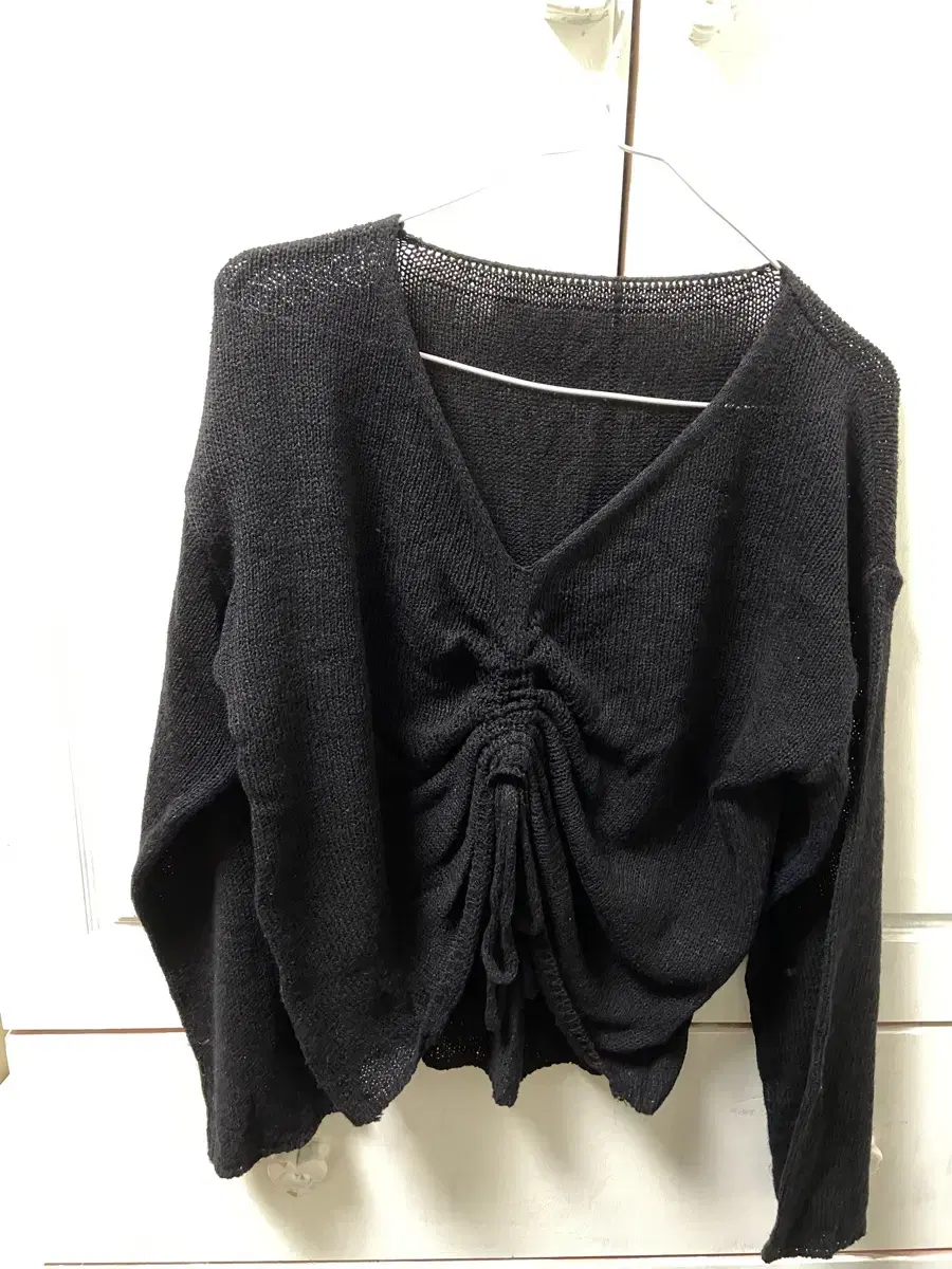 Loose-fitting black see-through ribbon knit