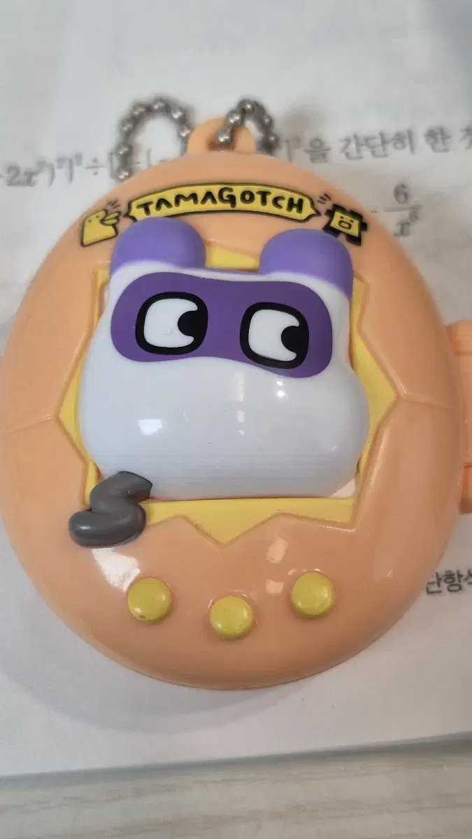 Tamagotchi keyring zuu orange zuu safety zuu