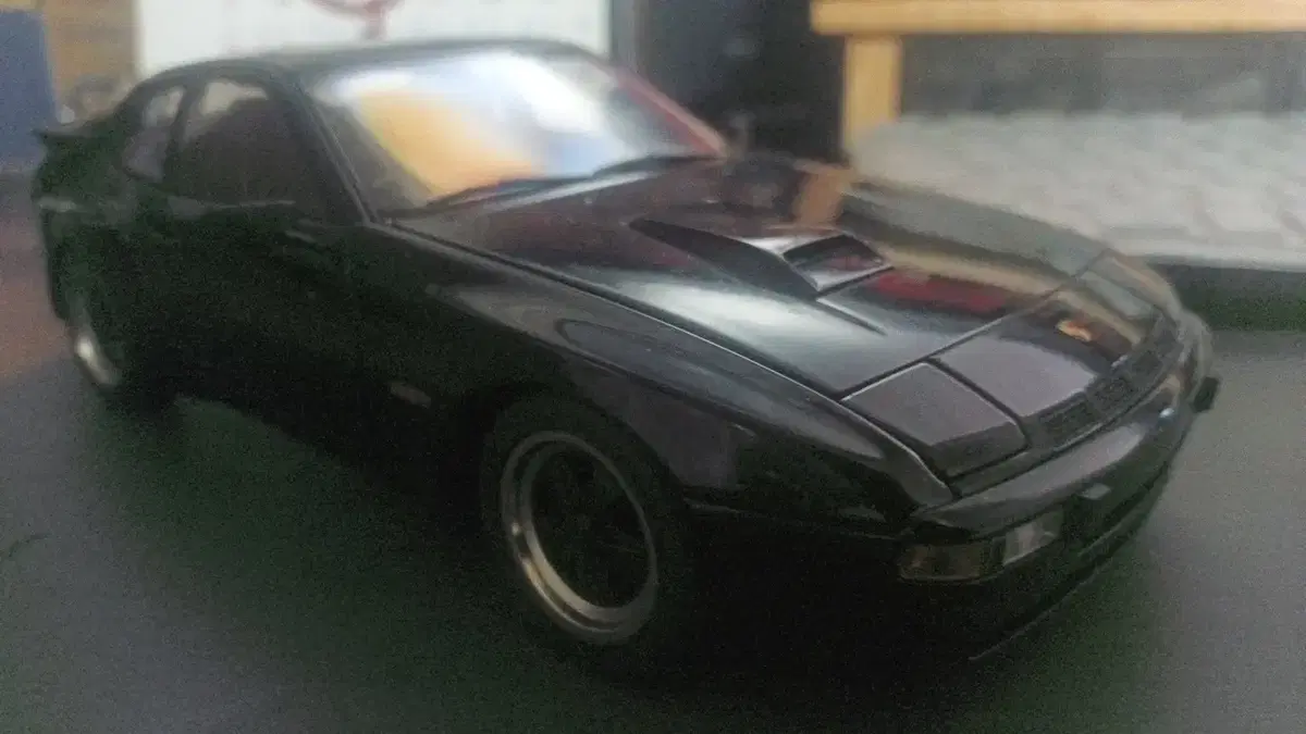 1:18 Autoart Porsche 924 (defects present) for sale.