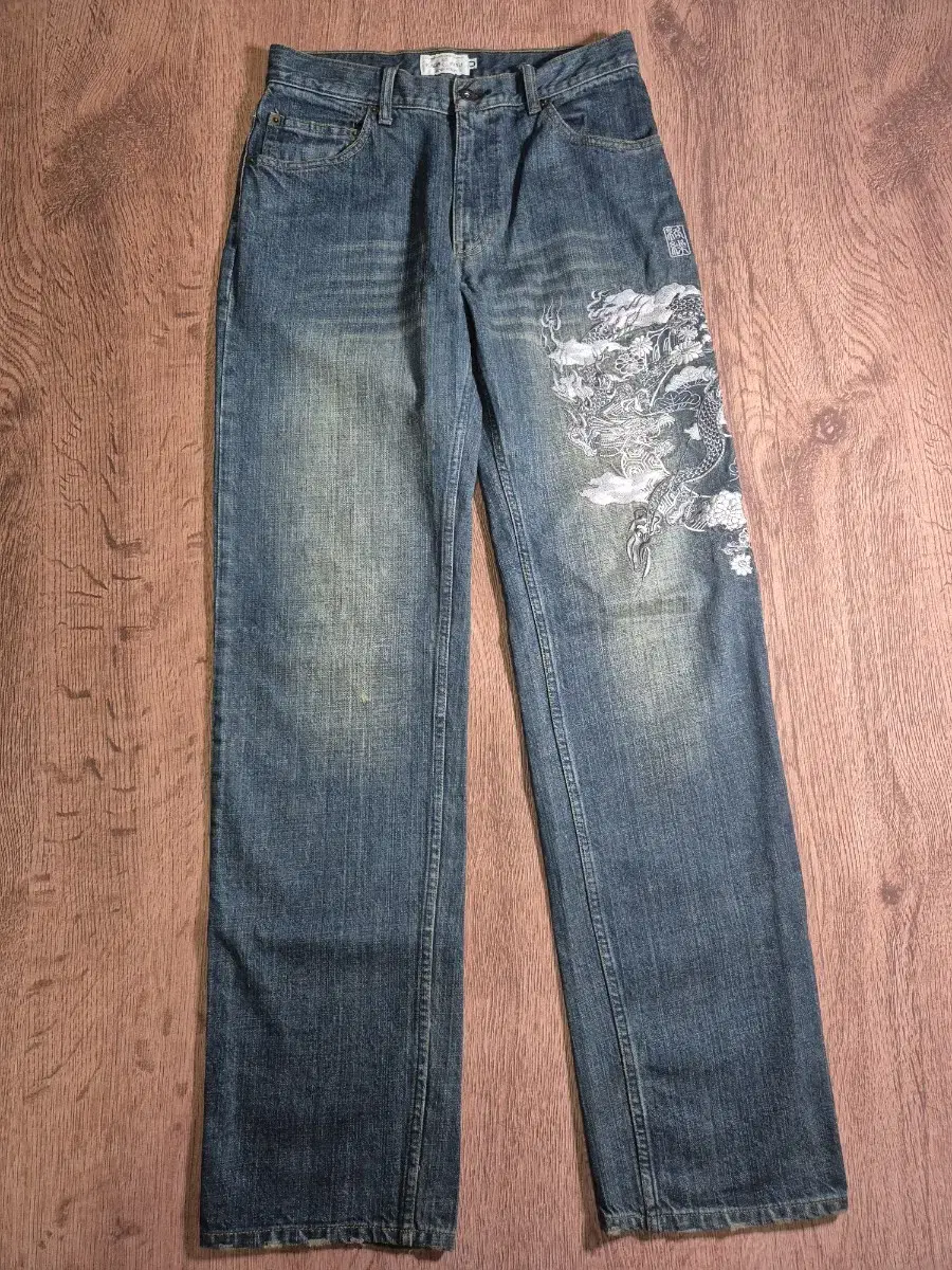 KARAKURI Embroidered denim pants for Tamashi Karakuri