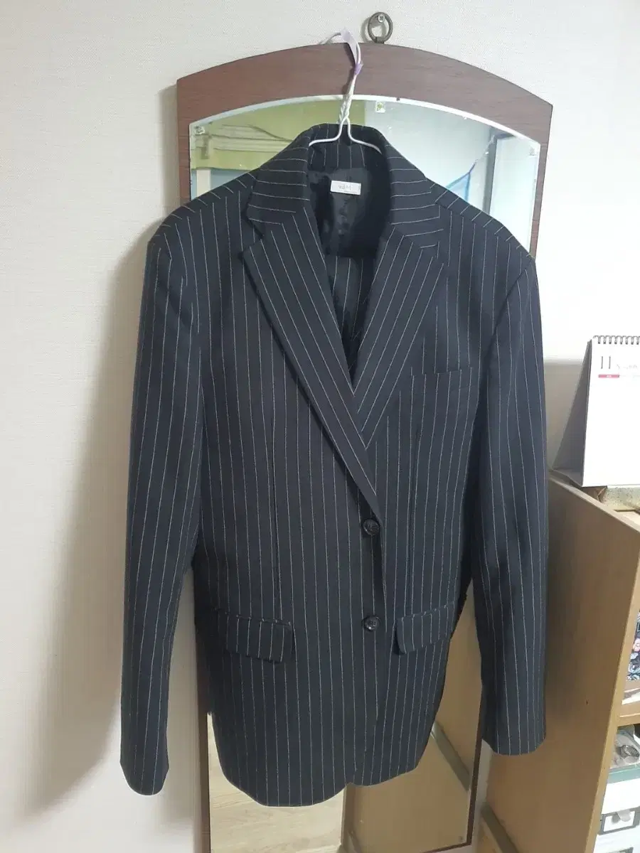 Striped black 3-piece suit set up for 95,000 won