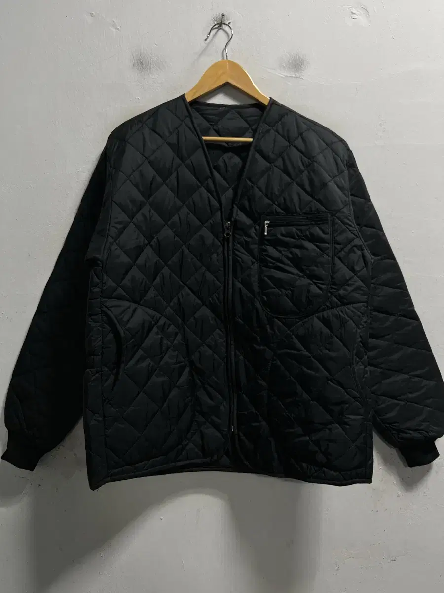 100 black quilted puffer jacket