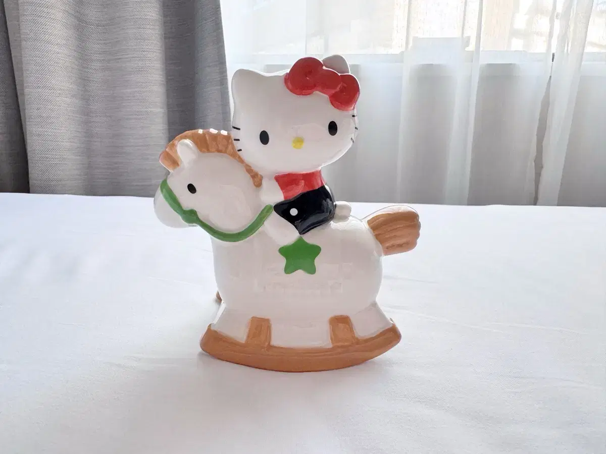 Sanrio Hello Kitty Rocking Horse Porcelain Piggy Bank