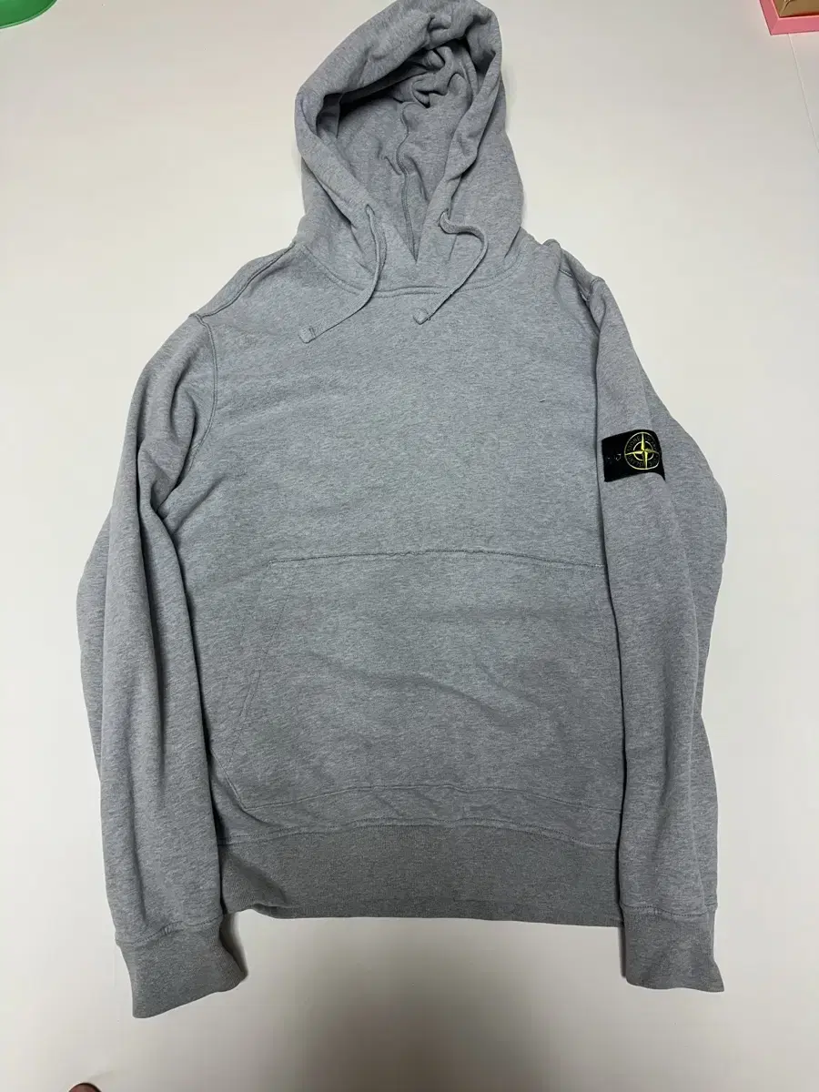 I'm selling a Stone Island hoodie in size XXL.