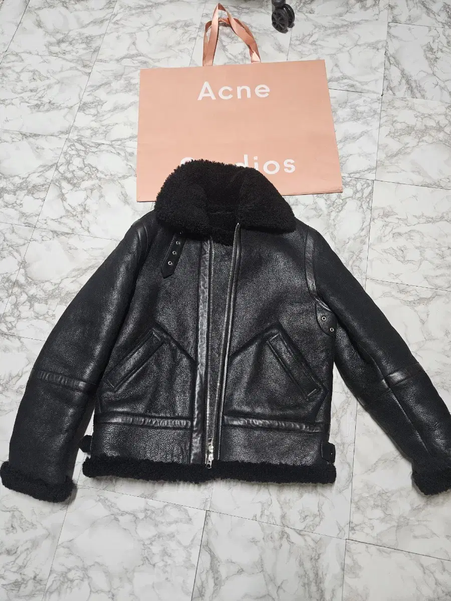 I'm selling a size 48 shearling mustang by Akne Ian.